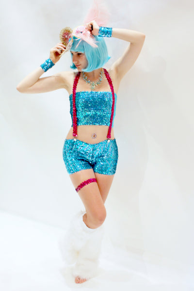 Our model is wearing the Short Sequins Hot Pant in Turquoise AB.
