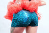 Our model is wearing the Short Sequins Hot Pant in Teal.