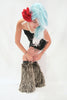 Our model is wearing the High-End Fur Leg Warmers in Wild Thing.