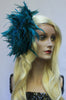 Our model is wearing the Fierce Rooster Hairclip in Turquoise Saddle Hackle.