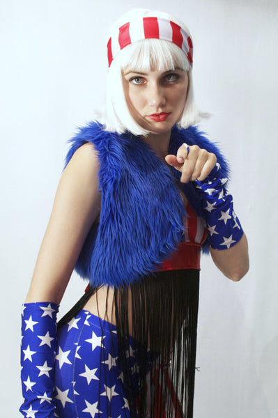 Our model is wearing the Fur Bolero Vest in Royal Blue.