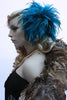 Our model is wearing the Fierce Rooster Hairclip in Turquoise Saddle Hackle.