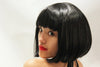 Our model is wearing the Babydoll wig in Black.