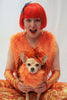 Our model is wearing the 1920's Bob  wig in Orange.