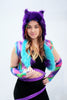 Our model is wearing the Fur Bolero Vest in Turquoise with Rainbow Swirl Lining.